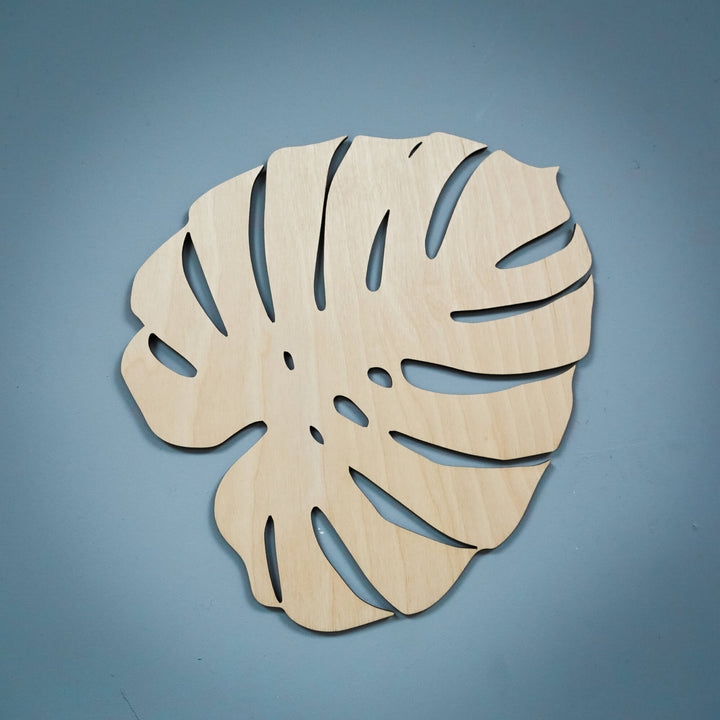 Monstera Leaf Wooden Wall Panel on Blue Background