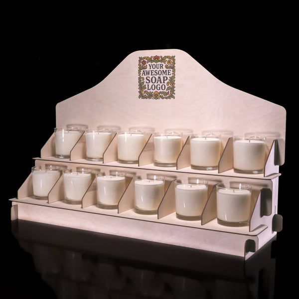 candle display stand loaded with small glass jar candles two rows