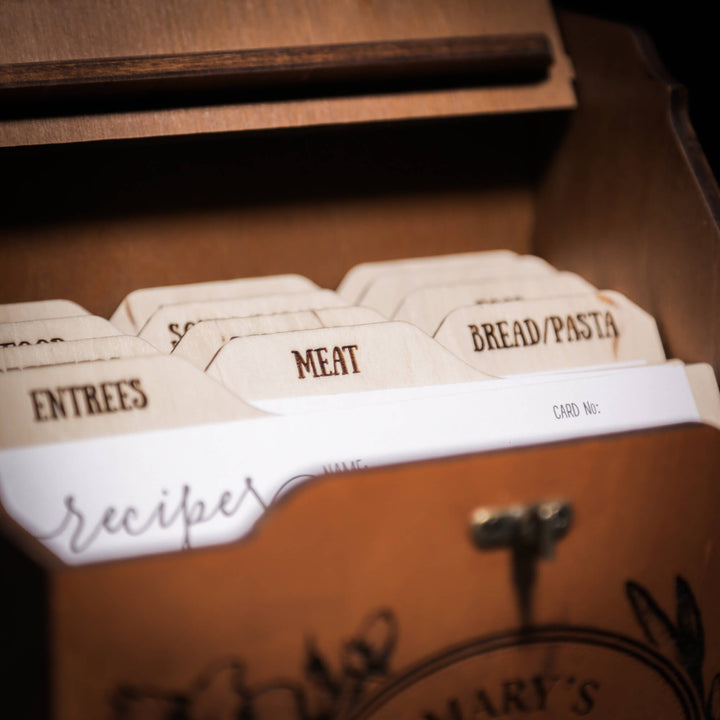 Close-up of labeled wooden recipe dividers