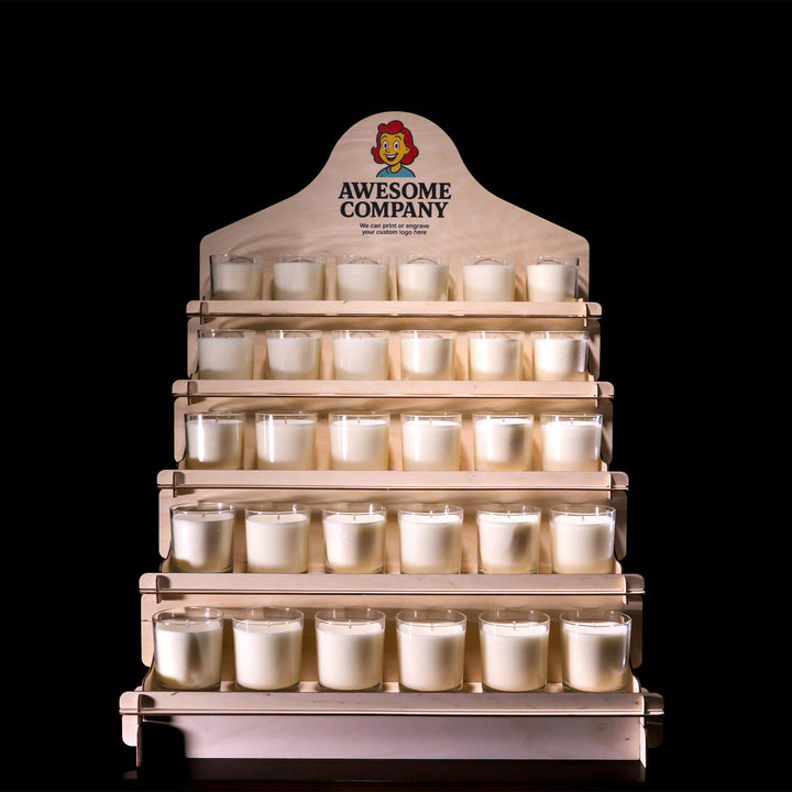 Wooden display rack with multiple small candles on a black background, branded 'Awesome Company'.