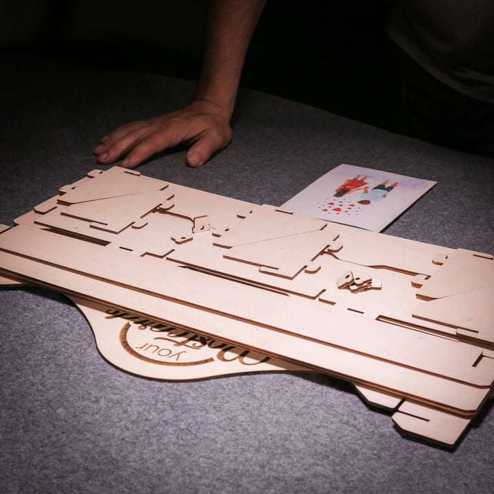 Disassembled wooden card holder components