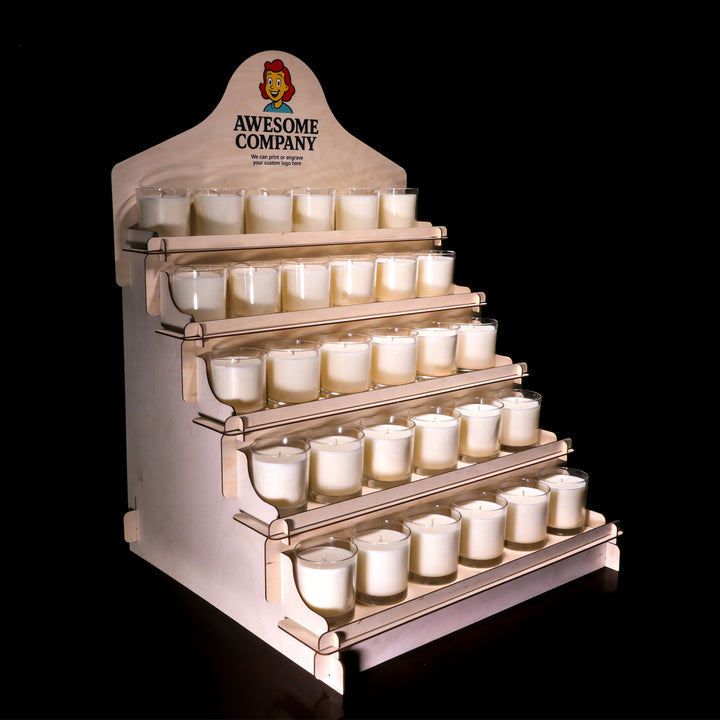 Display stand with multiple small candles on a black background, branded 'Awesome Company'.