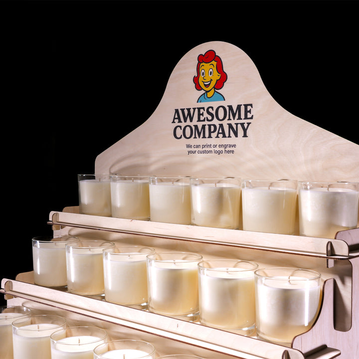 Display stand with candles and 'Awesome Company' branding on a black background