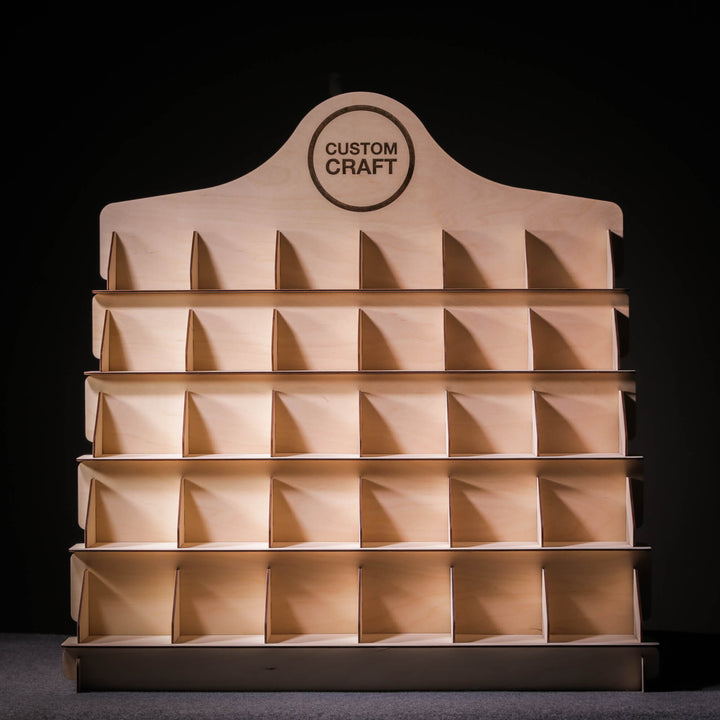 Front view of the wooden display stand with 5 tiers and 30 pockets.