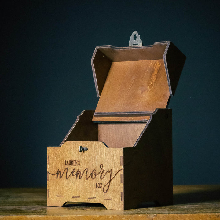 Wooden memory box with lid partially open