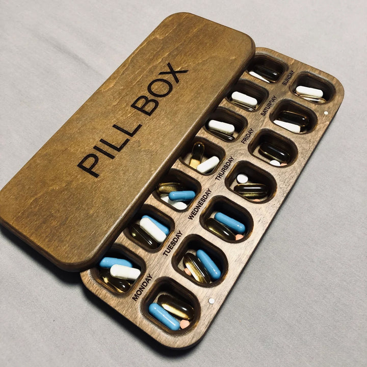 Engraved wooden pill box